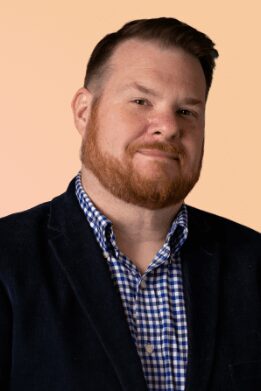 portrait photo of Shane Menkiewicz operations director of burning stick creative